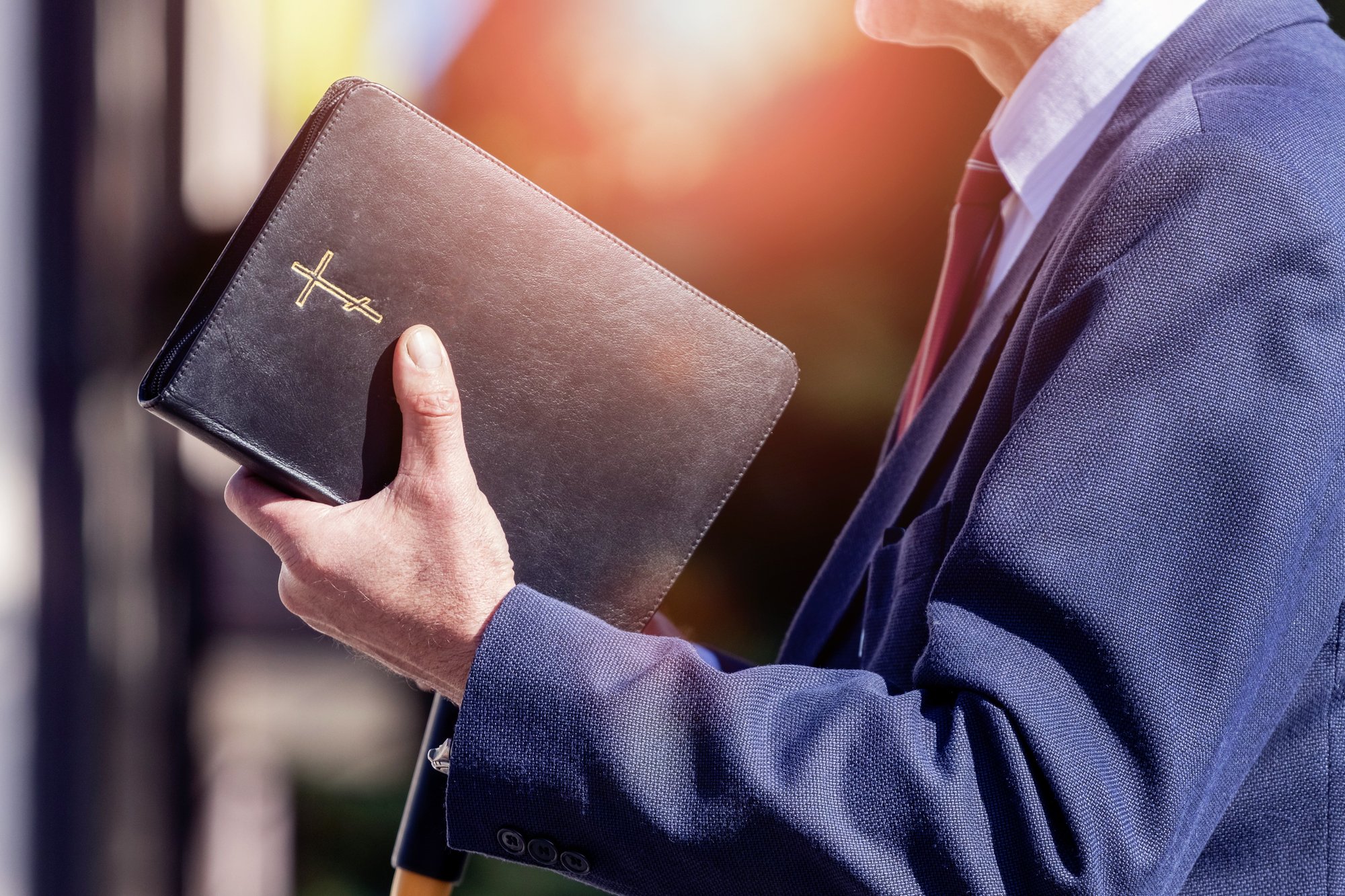 Preacher Holding Bible